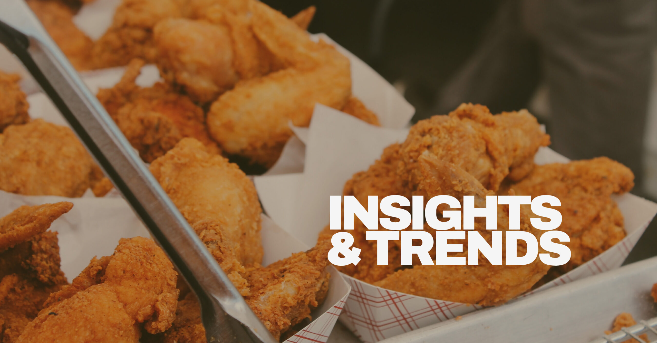Image depicting fried chicken with text displaying "Insights & Trends" as the blog category.